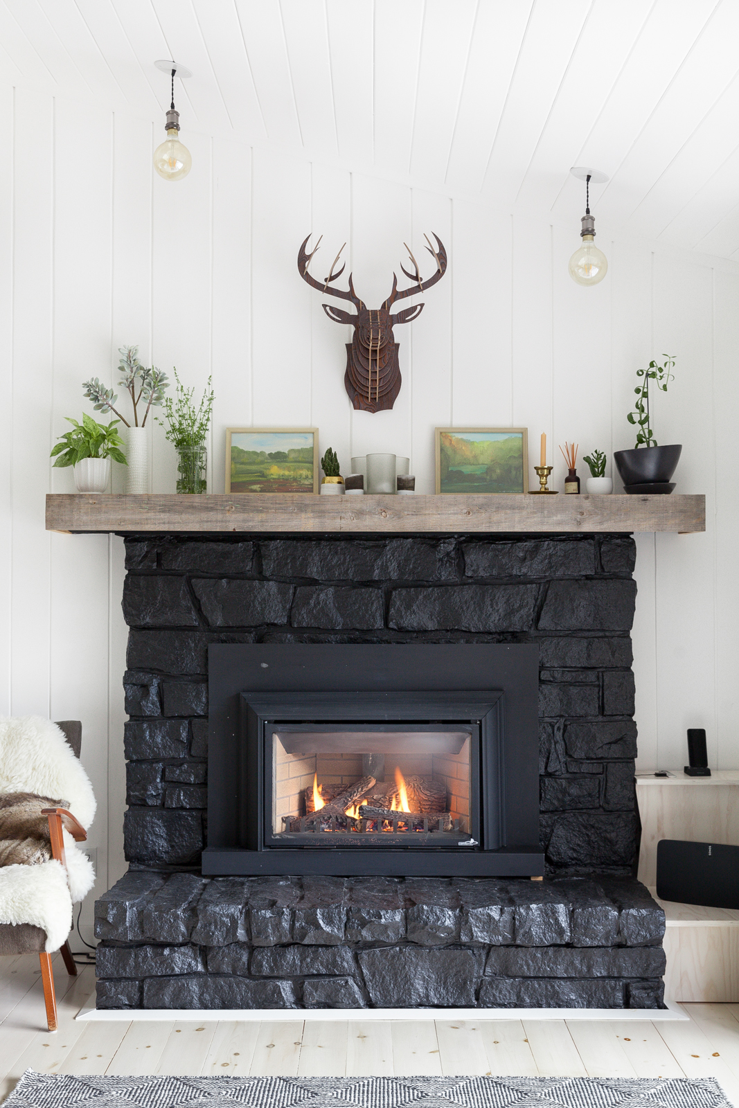 Yes, You Should Paint It Black Luminous black paint transformed this once-dreary fireplace.