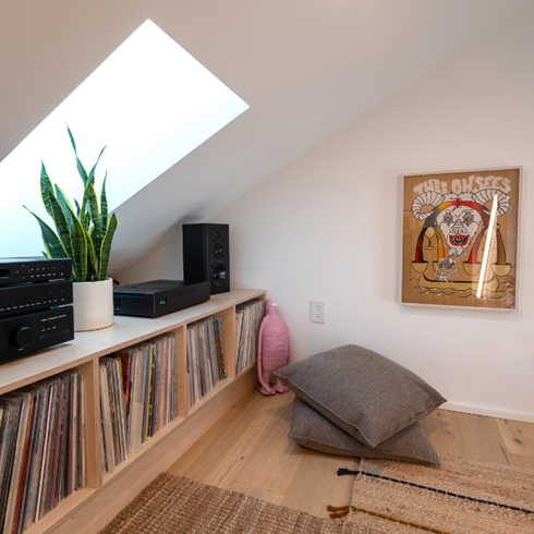 Beauty in Simplicity A shot of the loft space with records and a record player