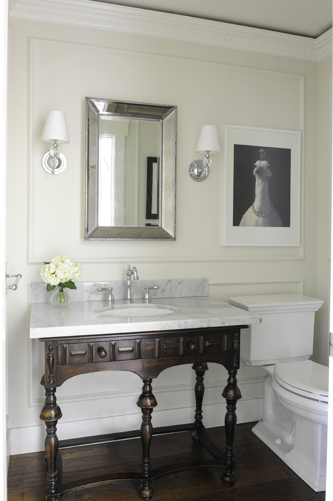 Pretty Powder Room Carmel extended the bathroom's vintage look into her powder room
