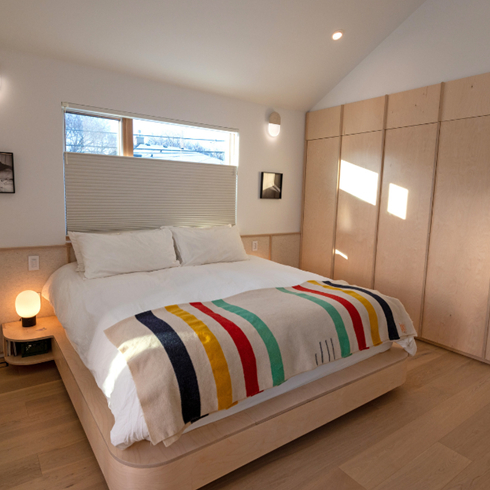 The Bedroom: A Scandi Retreat A cozy bedroom with a Hudson's Bay blanket