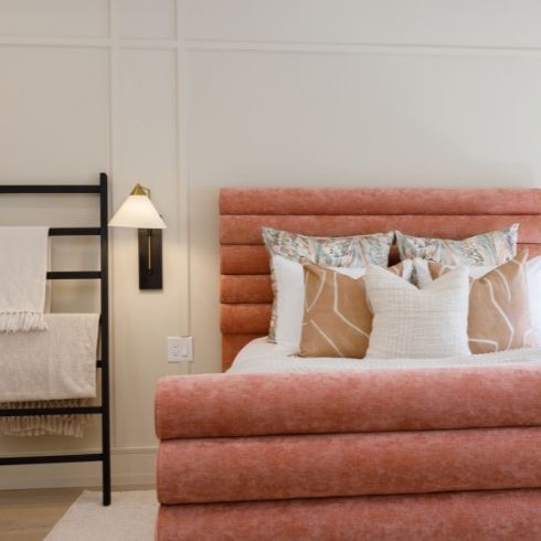 Clear the Clutter modern minimalist white bedroom with pink headboard and white bed