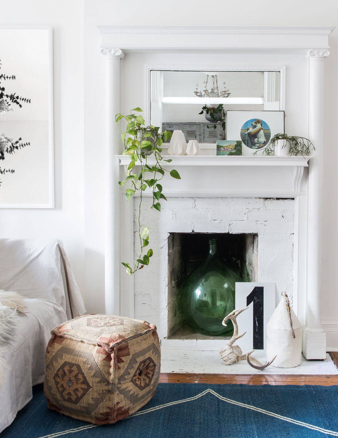 Natural Selection Vintage fireplace design with white-painted brick.