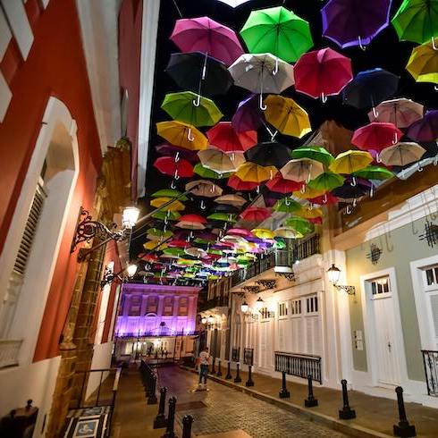 5. San Juan, Puerto Rico Assorted Coloured Umbrellas Hanging Near Buildings in San Juan, Puerto Rico