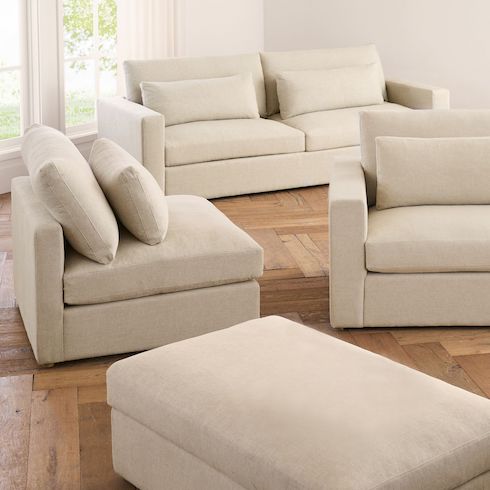 Cashing In on Comfort Cloud couch dupes feauting Westwood Square Arm Sectional from Pottery Barn with all its modules shown independently in a bright living room with white walls and wood floors