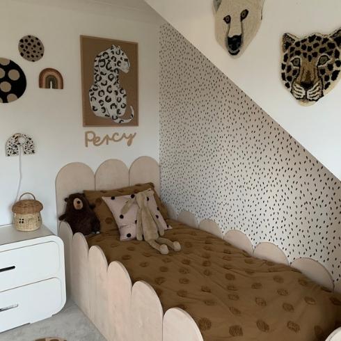 On Safari Kid's bed in nook with safari theme
