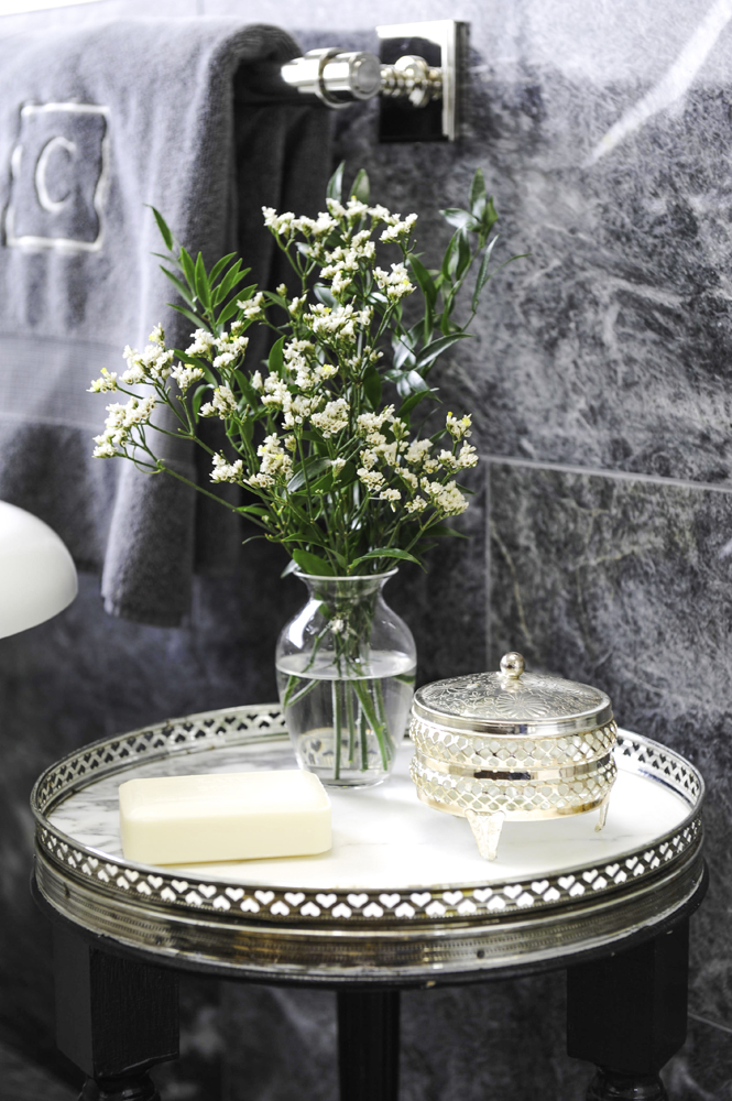 Re-Imagine a Side Table This tray-top table introduces a vintage element that's both pretty and practical