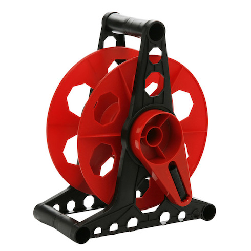 9. Do String Me Along Woods Standing Storage Reel on a white background as part of Home Network The Secret to Storing Holiday Decorations in Small Spaces