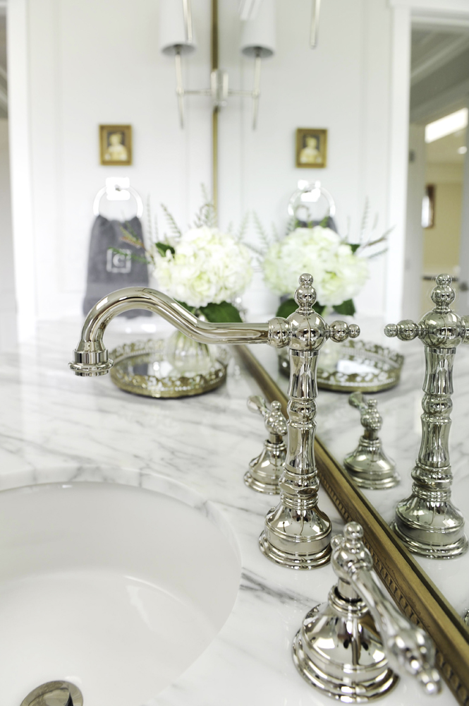 Choose Soft Finishes Polished nickel bathroom fixtures.