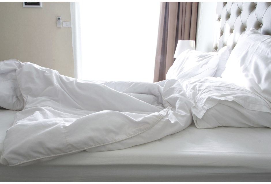 Do and Don’t: Pillows and Duvets unmade bed with pillows and duvet