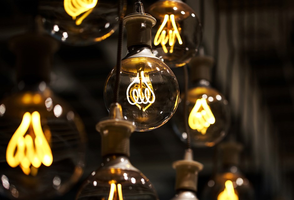 1. Find Out How Much Electricity You’re Using Various lightbulbs hanging