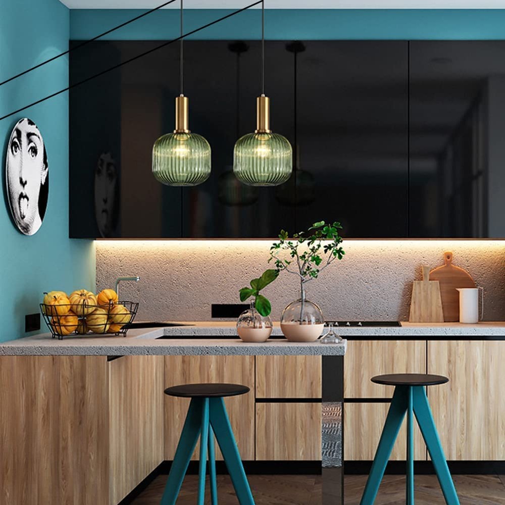 Green Globe Plug-In Pendant Lights Green glass globe pendant lights over kitchen counter