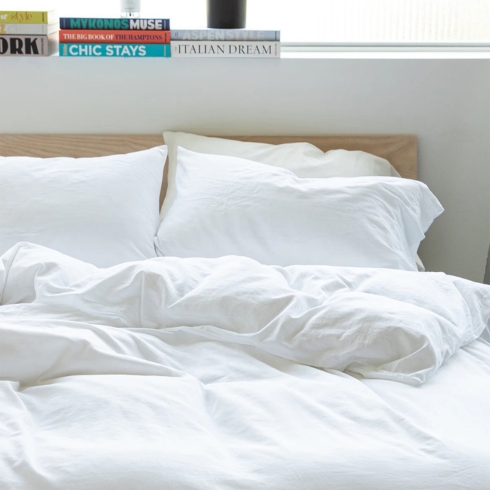 8. Au Lit Fine Linens Set of washed cotton sateen bed sheets by Au Lit Fine Linens
