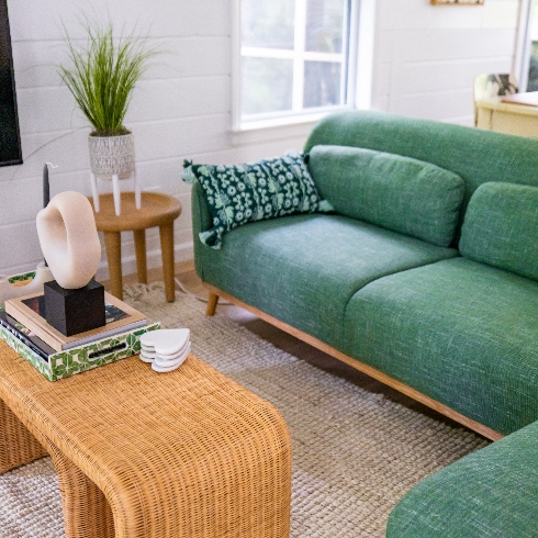 Furniture and Mattresses A green living room sofa and wooden coffee table