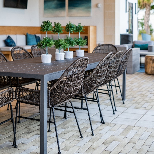 Outdoor Furniture An outdoor dining set with table and chairs