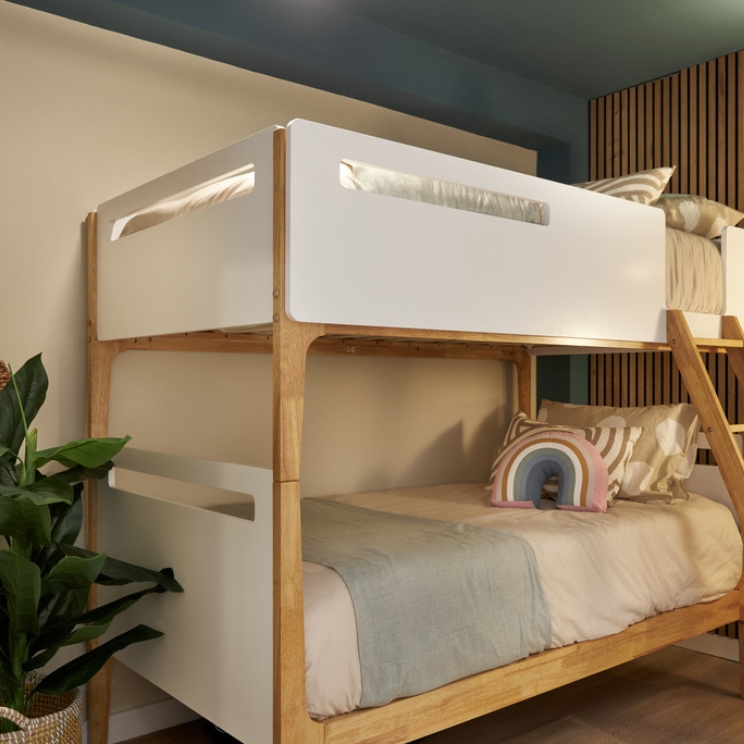 Family Getaway White bunk beds in a kids room