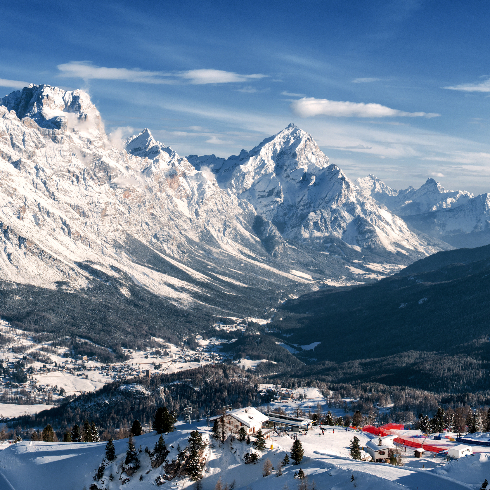 Cortina d’Ampezzo, Italy Skiiers at Cortina d'Ampezzo Ski Resort in Veneto, Italy's Dolomites.