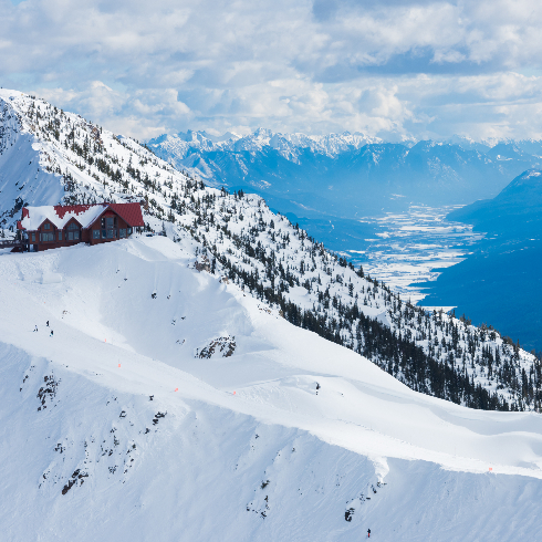 Kicking Horse Mountain Resort, BC A red cabin on a mountain at Kicking Horse Ski Resort in Golden, British Columbia.