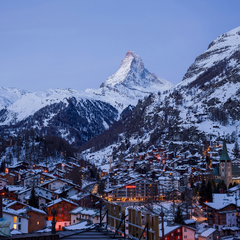 Zermatt, Switzerland The town of Zermatt in Switzerland at dusk with the Matterhorn in the background.