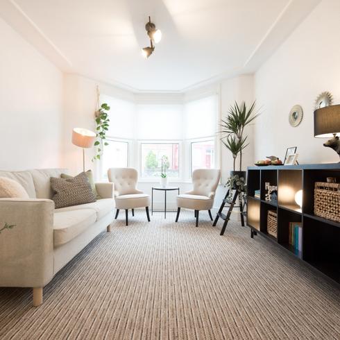 New Carpeting A spacious living room with carpet