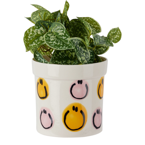 Taurus (April 20-May 20): Ceramic Planter A white ceramic planter with quirky colourful smiley faces