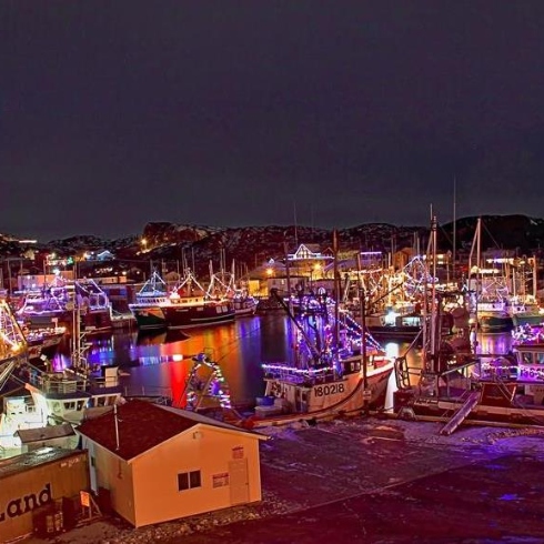Bay Roberts, Newfoundland Boats and houses illuminated with colourful lights in Bay Roberts, Newfoundland & Labrador during their Festival of Lights.