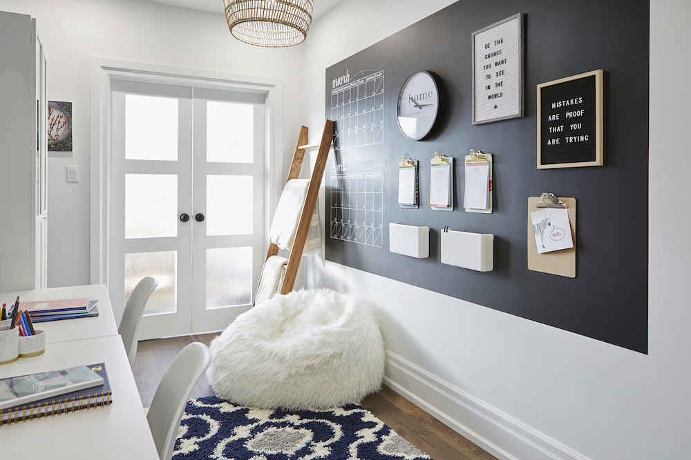 Layer on the Cozy Textures bright workspace with blanket ladder, plush white bean bag chair and organizers on wall