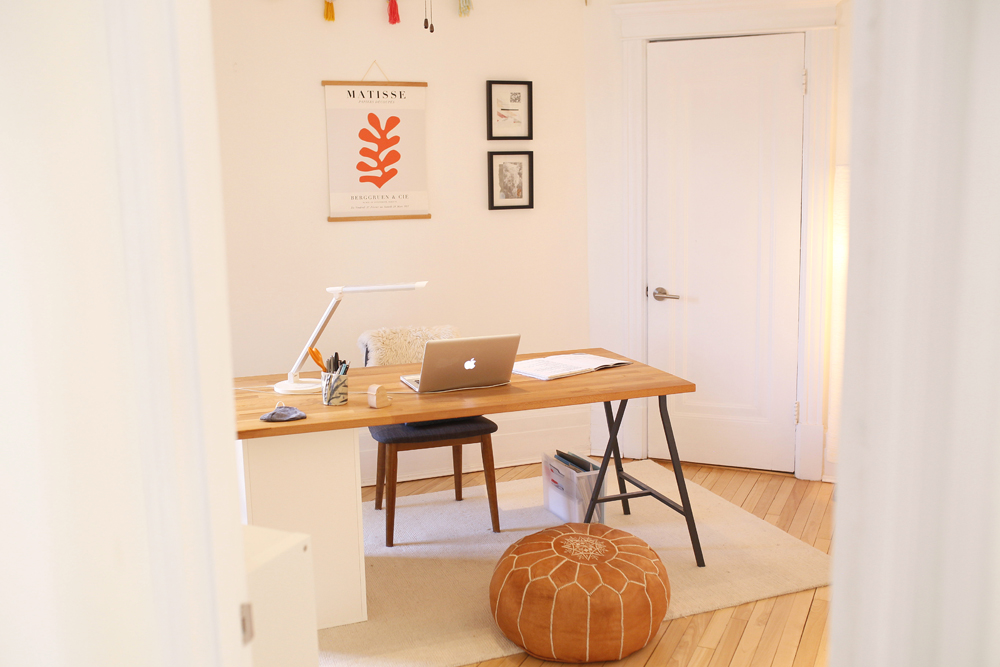 Add an Area Rug minimal home office with wood desk and beige area rug