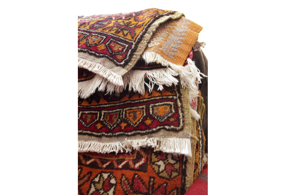 Do: Rugs pile of rugs