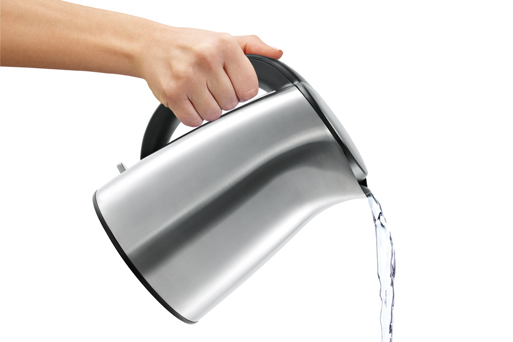 Different Types of Drain Cleaners person pouring boiling water