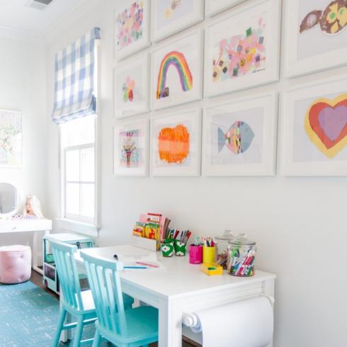 Worthy of Display A white gallery wall displaying kids artwork