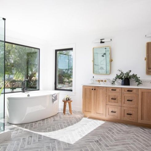 Make Your Home More Efficient Modern bathroom with big picture windows with black casing
