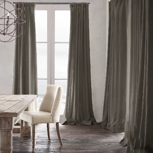 Heavyweight Drapery Deep grey heavyweight linen drapes on dining room windows