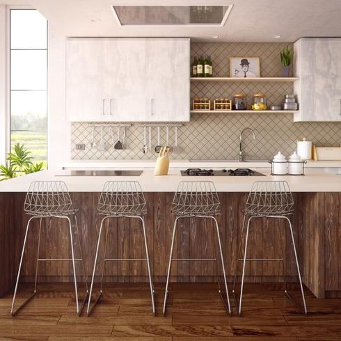 4. Vacuum Your Cabinets a kitchen with white counters and brown kitchen cabinet