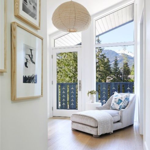 A Focus on Comfort Chaise lounge in primary bedroom suite