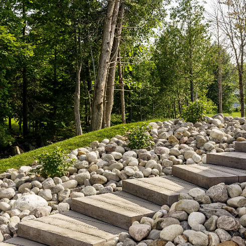 Rock it Out A tidy front yard walkway lined with stones