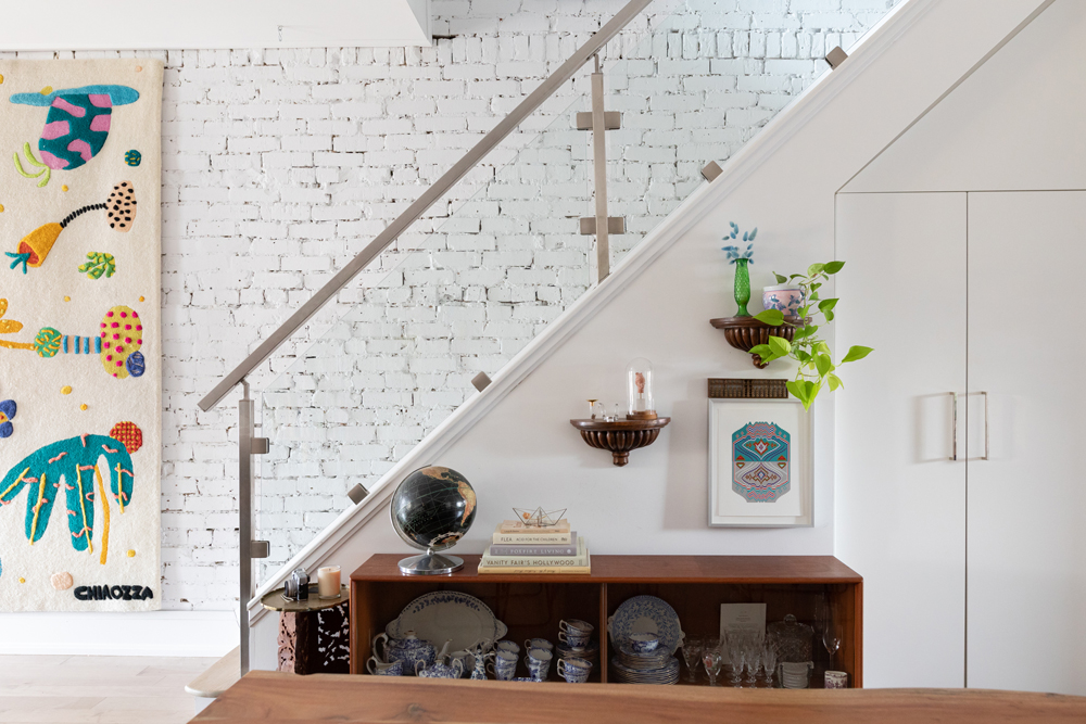 Clear Vision Side view of white staircase with glass railing