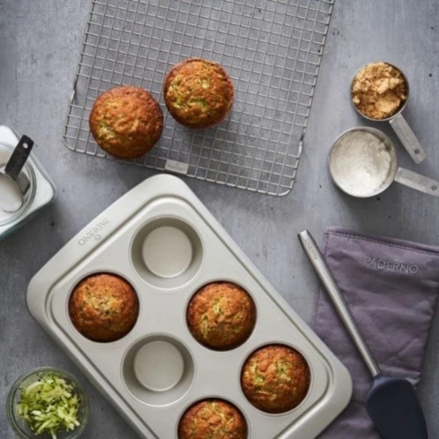 Paderno A muffin pan with freshly baked muffins.