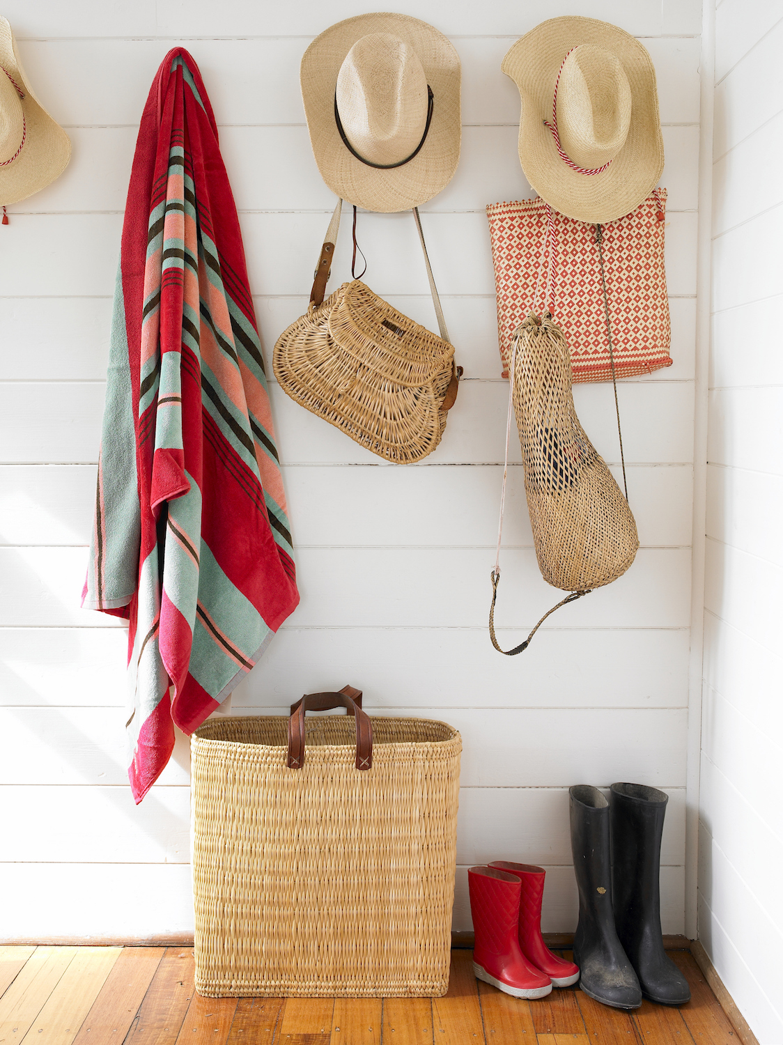 Don’t Let Clutter Take Over Hooks on a wall for hats, bags and towels