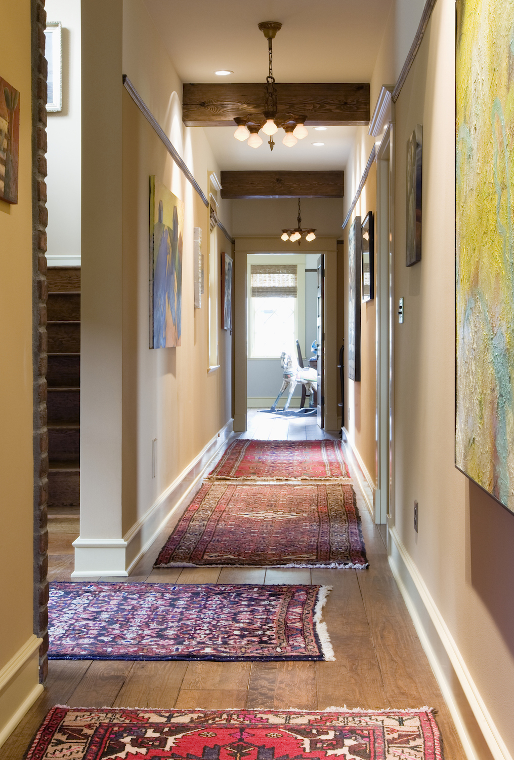 Don’t Overlook the Floors Lots of vintage carpets in the hallway of a home