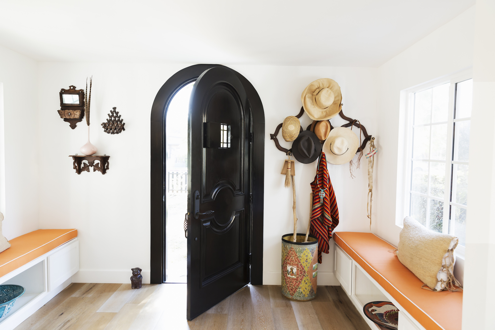 Do Keep it Practical modern front entryway with two built-in benches that include storage