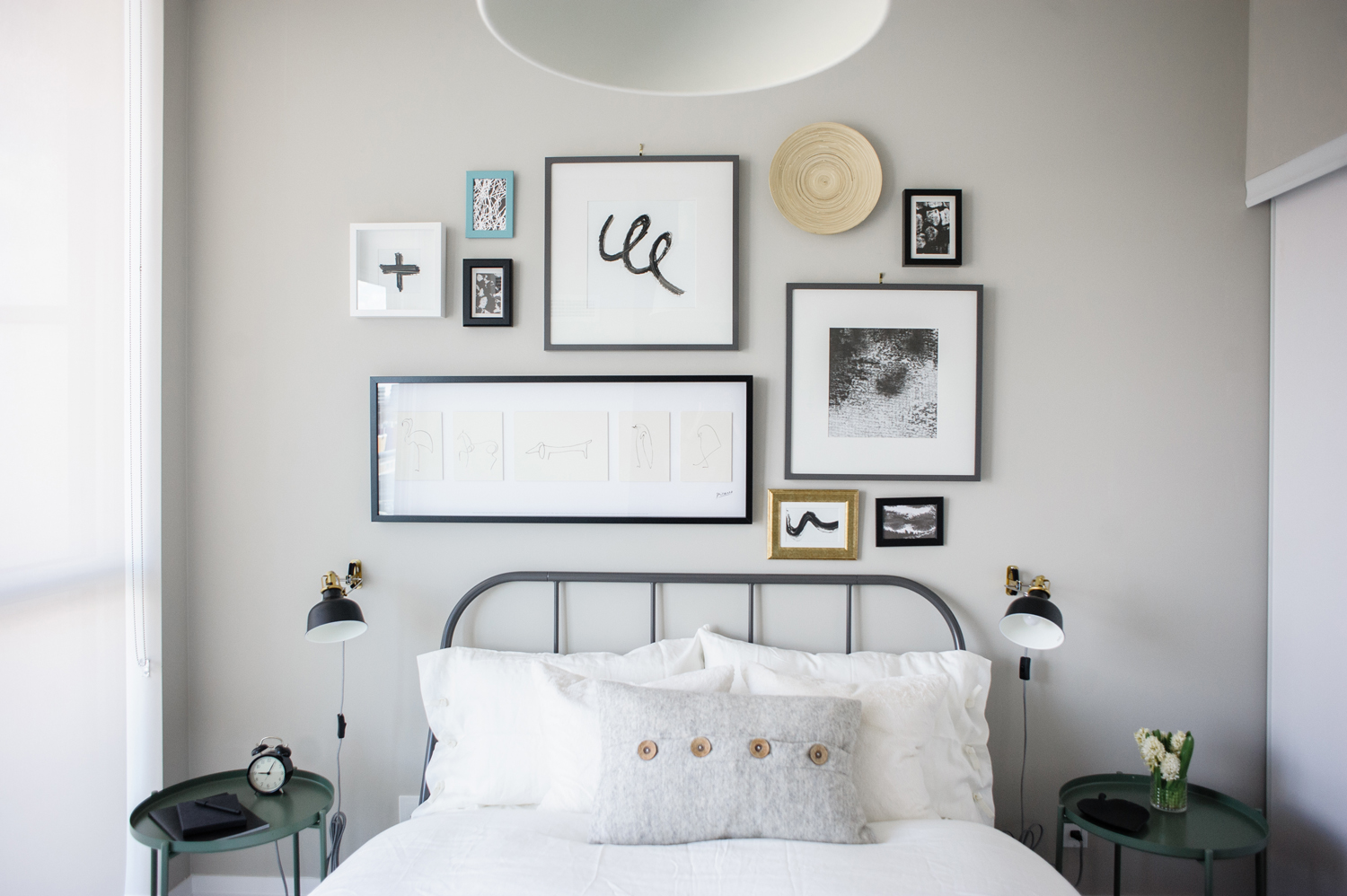 Make Yourself at Home Grey guest bedroom with gallery wall