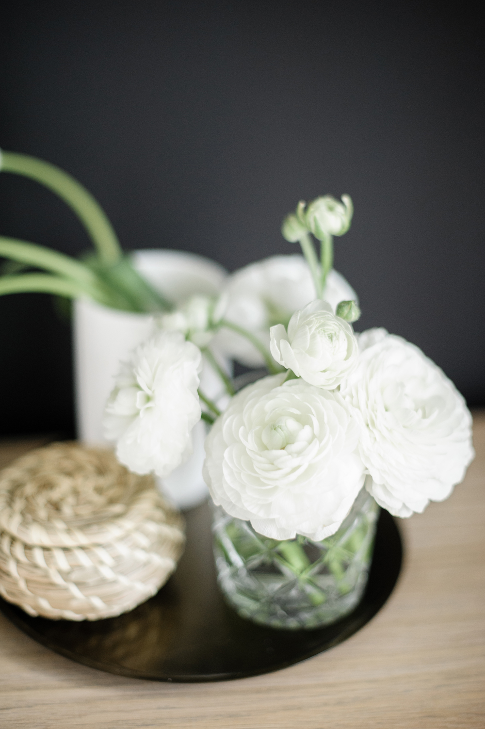 Must-Have Blooms White flowers on a bedside table