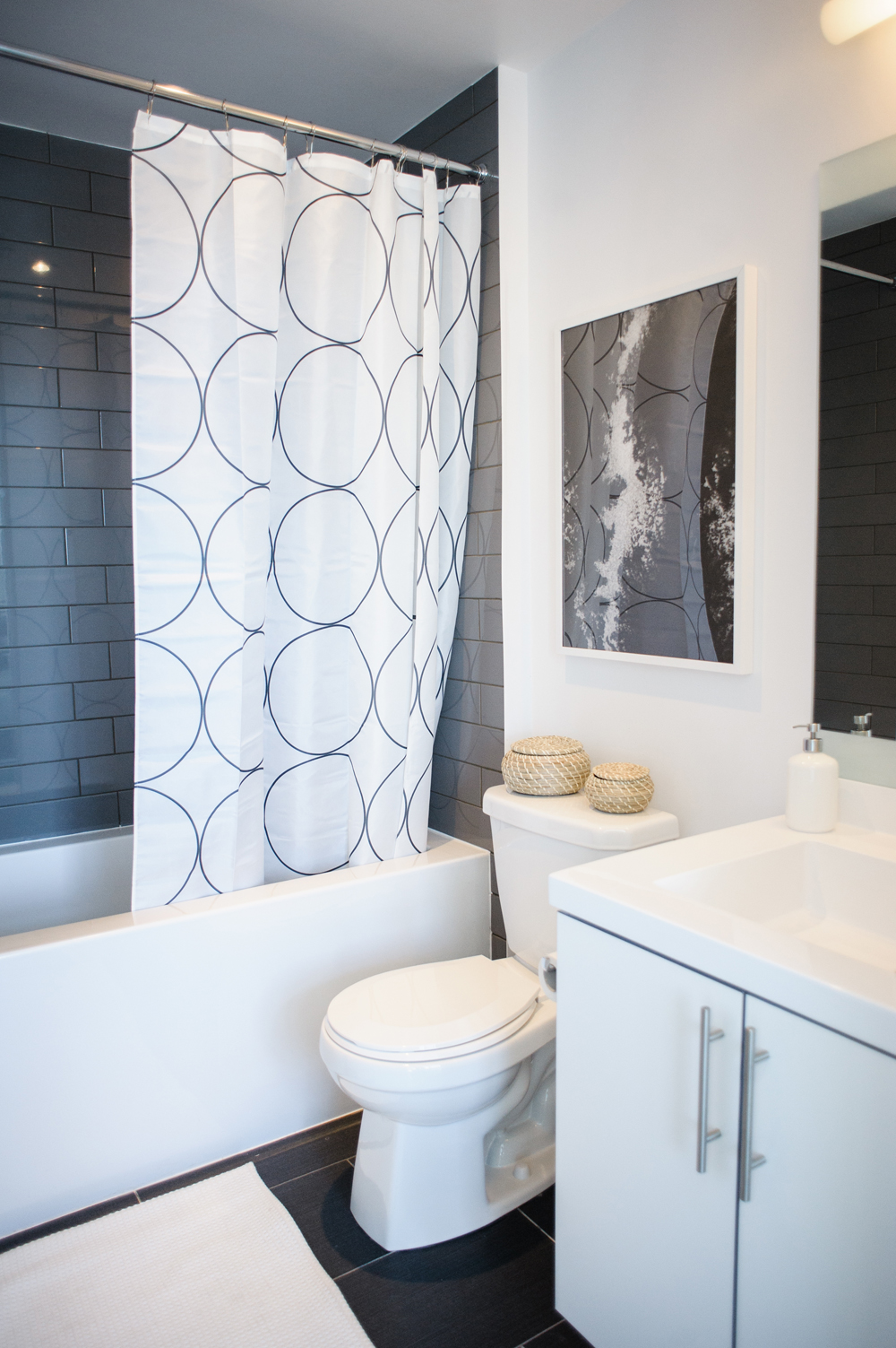 The Master Bath Simple white and grey bathroom