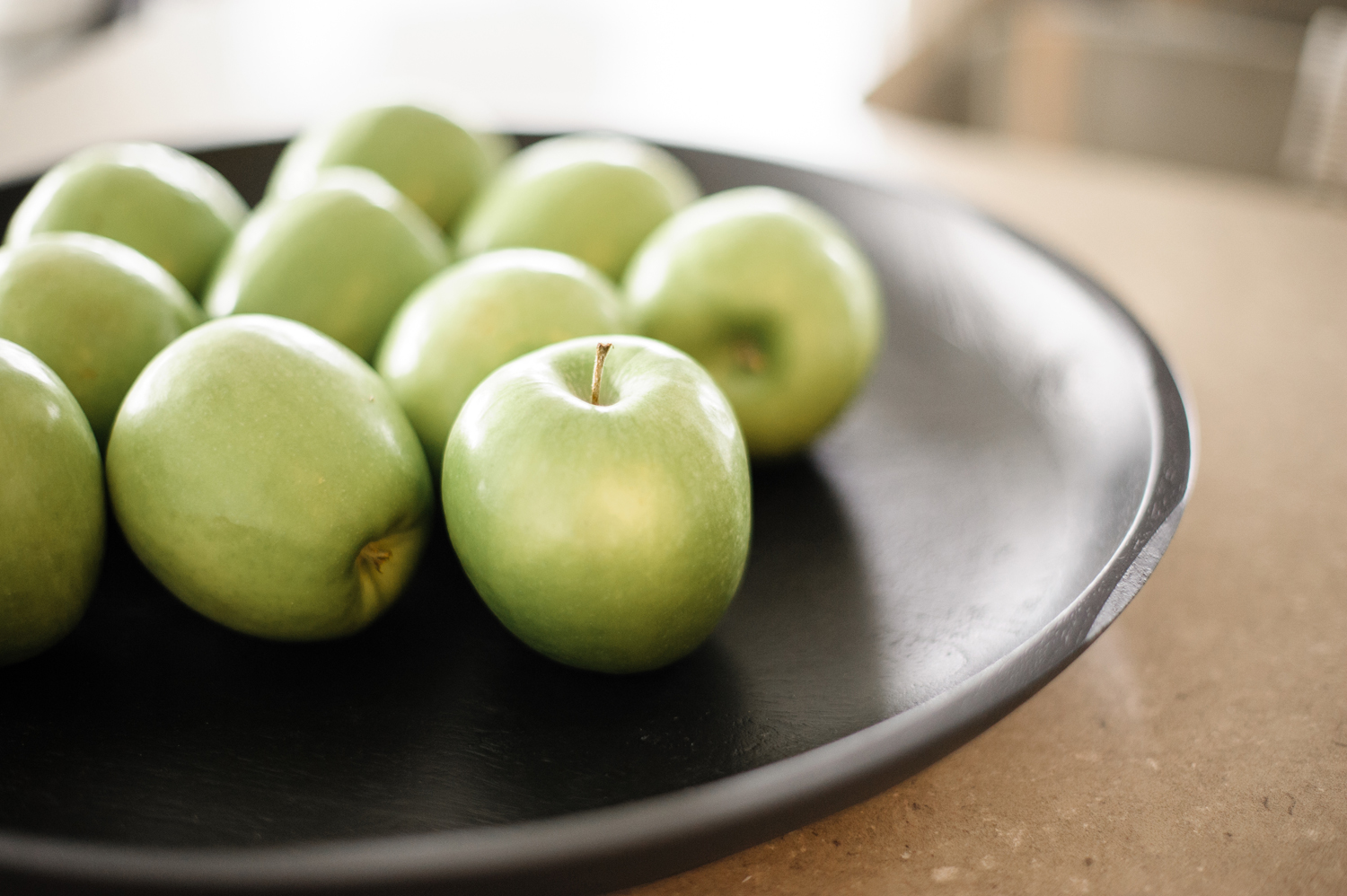 Handy and Healthy Bowl of bright green apples