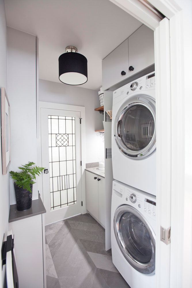 Stack Up Narrow laundry room design, black and white palette.