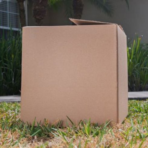 Use Cardboard Boxes Cardboard box on lawn