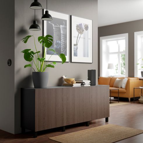 Stylish Sideboard Walnut-toned sideboard in living room