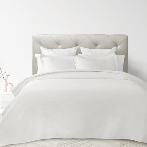 QE Home Linens White bedding in a white bedroom.