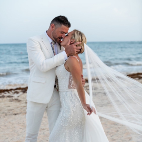 How Kortney Met Ryan Kortney Wilson and Ryan Vella kissing at wedding