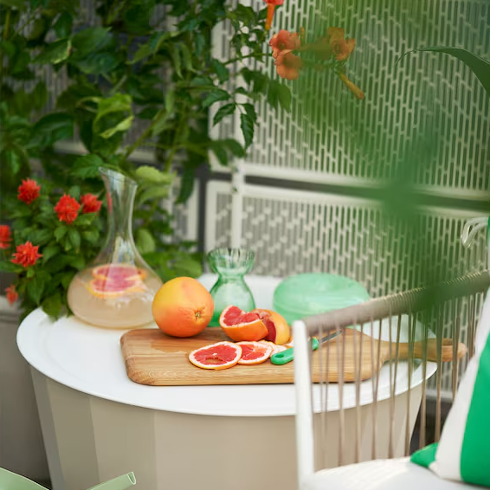 Two-in-One Table The LAGASKAR table from IKEA on an outdoor patio space